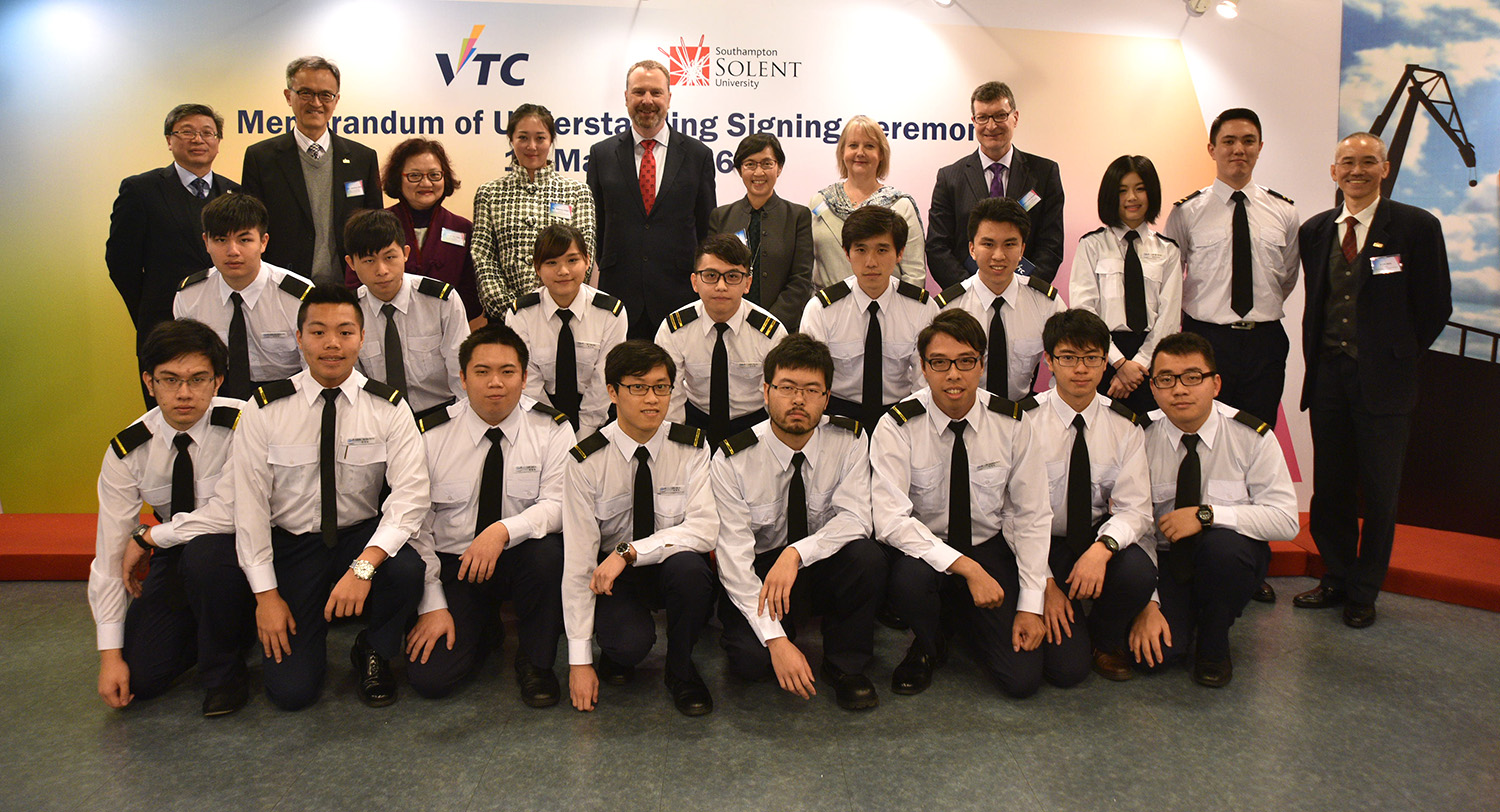 A group photo with guests and MSTI students after the MoU signing ceremony