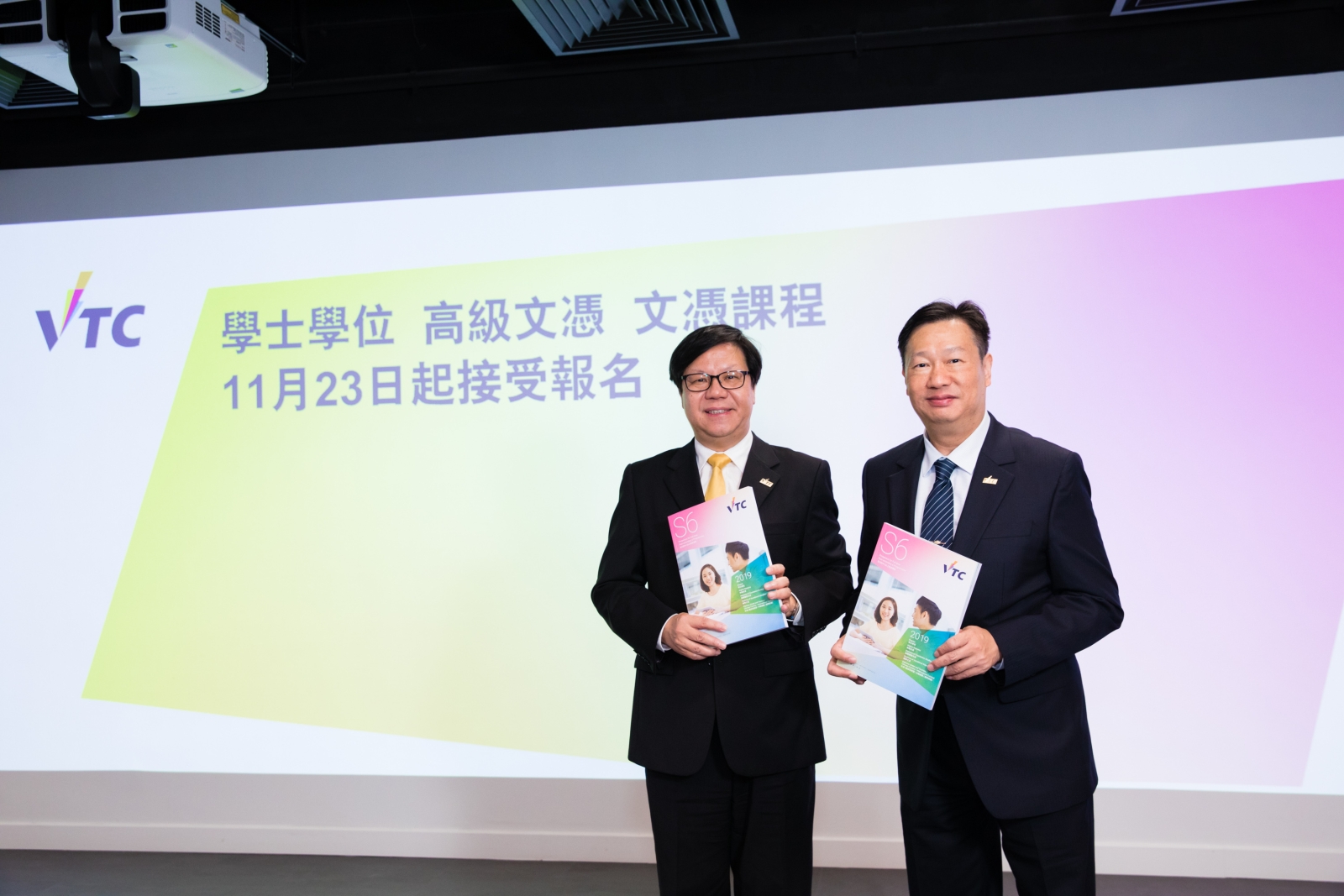 VTC Deputy Executive Director LEUNG Yam-shing (left) and Acting Deputy Executive Director Edmond YU (right) introduce the 2019/20 VTC programmes tailored for Secondary 6 students
