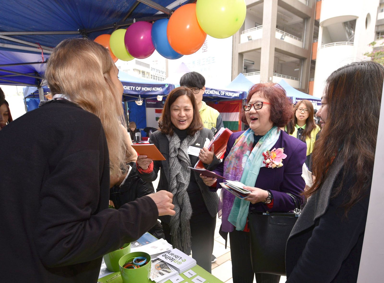 VTC Executive Director Carrie YAU toured the cultural booths to experience the uniqueness of different cultures and traditions